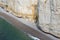 Colorful limestone cliffs with beach near Etretat in Normandie France