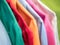 Colorful linen shirts hanging