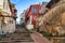 Colorful living houses along stone stairway