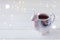 Colorful Llama shaped mug on the white wooden table, soft selective focus