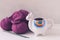 Colorful Llama shaped tea or coffee mug with knitting needles, wool yarn