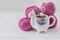 Colorful Llama shaped tea or coffee mug with wool yarn and steam in form of heart