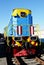 Colorful locomotive standing on rails