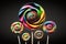 Colorful lollipops on black background