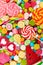 Colorful lollipops and candy. Top view.