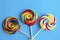 Colorful lollipops and different colored round candy