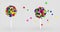 Colorful lollypop balls scattering colorful chocolate chips on white background
