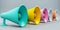 Colorful loudspeakers megaphone set white background