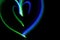 Colorful luminous hearts. Light painting. Long exposure photography