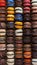 Colorful macaron background with assorted vibrant collection of sweet french desserts