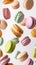 colorful Macaron Cascade: Vibrant Delicacies Against White Background