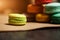 Colorful macarons cake. Closeup macaroons on color white isolated background. in coffee shop vintage color. Wooden table