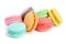 Colorful macarons isolated on white background closeup