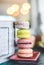 Colorful macaroon cakes on a vintage wooden table