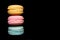 Colorful macaroon over black