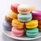 Colorful macaroons on background