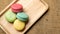 Colorful macaroons on gray background