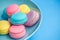 Colorful macaroons in plate