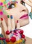 Colorful makeup and manicure.