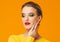 Colorful makeup woman red lips in yellow clothes on color happy summer fashion background manicured nails