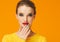 Colorful makeup woman red lips in yellow clothes on color happy summer fashion background manicured nails