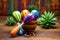 colorful maracas on a rustic wooden table, with a succulent cactus in the background