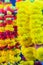 Colorful marigold flower garlands for hindu religious ceremony.