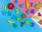 Colorful math fractions, numbers on blue pink white background. Interesting, fun mathematics for kids, preschooler. Education,