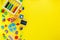 Colorful math fractions, numbers, letters on yellow background. Interesting, fun math for kids. Education, back to school