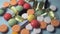 Colorful medical drugs pills vitamins capsules closeup macro