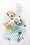 Colorful meringue cookies over white wooden background