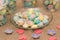 Colorful meringues in dish