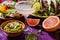 Colorful Mexican Feast with Margarita, Tacos, and Fresh Guacamole on Vibrant Table Setting