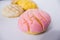 Colorful Mexican sweet bread on a white table