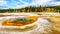The colorful minerals in the Chromatic Pool in the Upper Geyser Basin in Yellowstone National P