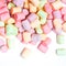 Colorful mini marshmallows isolated on white background, macro.