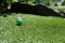 Colorful Miniature Golf Balls on Putting Green