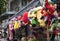 Colorful minions and superman puppets hanging for sale at an old street in Hanoi quarter streets