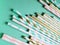 Colorful mint, pink and golden drinking straws for beverages