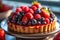 Colorful Mixed Berry Tart on White Plate