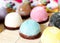 The colorful mochi dessert ice cream on wood plate ,Close Up photo with selective focus.