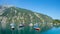 Colorful moored sailboats, lake Achensee, mountain view Seebergspitze, austria