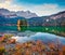 Colorful morning scene of Eibsee lake with Zugspitze mountain range on background. Amazing autumn view of Bavarian Alps, Germany,