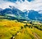 Colorful morning view of Grindelwald village. Wetterhorn and Wellhorn mountains, located west of Innertkirchen in the Bernese Ober