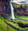 Colorful morning view from the middle of Kvernufoss waterfall. Majestic summer scene of south Iceland, Europe. Beauty of nature