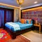 A colorful, Moroccan-themed bedroom with intricate mosaic tile patterns, draped fabrics, and lantern lighting2, Generative AI