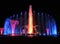 Colorful musical fountain. Magnificent night show of colorful lights, laser beams, music