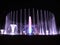 Colorful musical fountain. Magnificent night show of colorful lights, laser beams, music