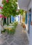 Colorful narrow alley in Milos island, Greece