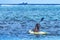 Colorful Native Woman Canoing Cargo Ship Blue Water Moorea Tahiti